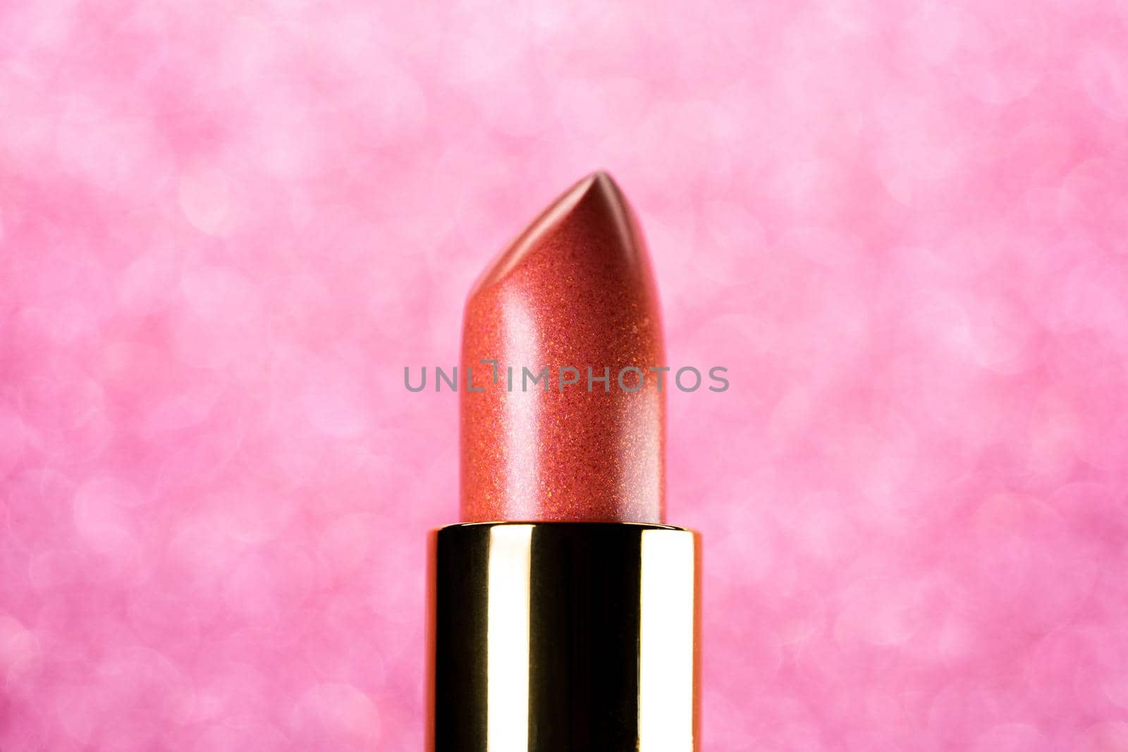 Lipstick on pink background. Showcase or advertisement for beauty brand, Concept of fashion, cosmetics. High quality