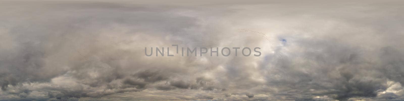 Sky panorama on overcast rainy day with low clouds in seamless spherical equirectangular format. Complete zenith for use in 3D graphics, game and for aerial drone 360 degree panorama as a sky dome.