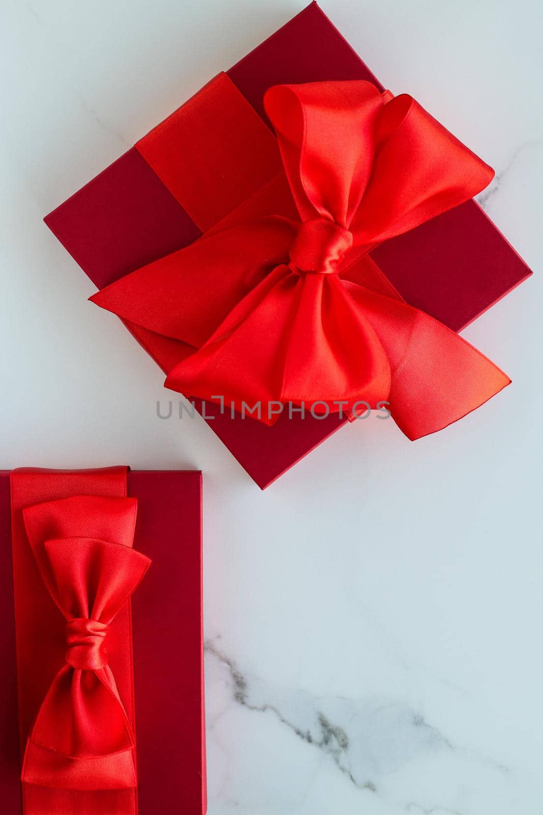 Romantic celebration, lifestyle and birthday present concept - Luxury red holiday gifts on marble