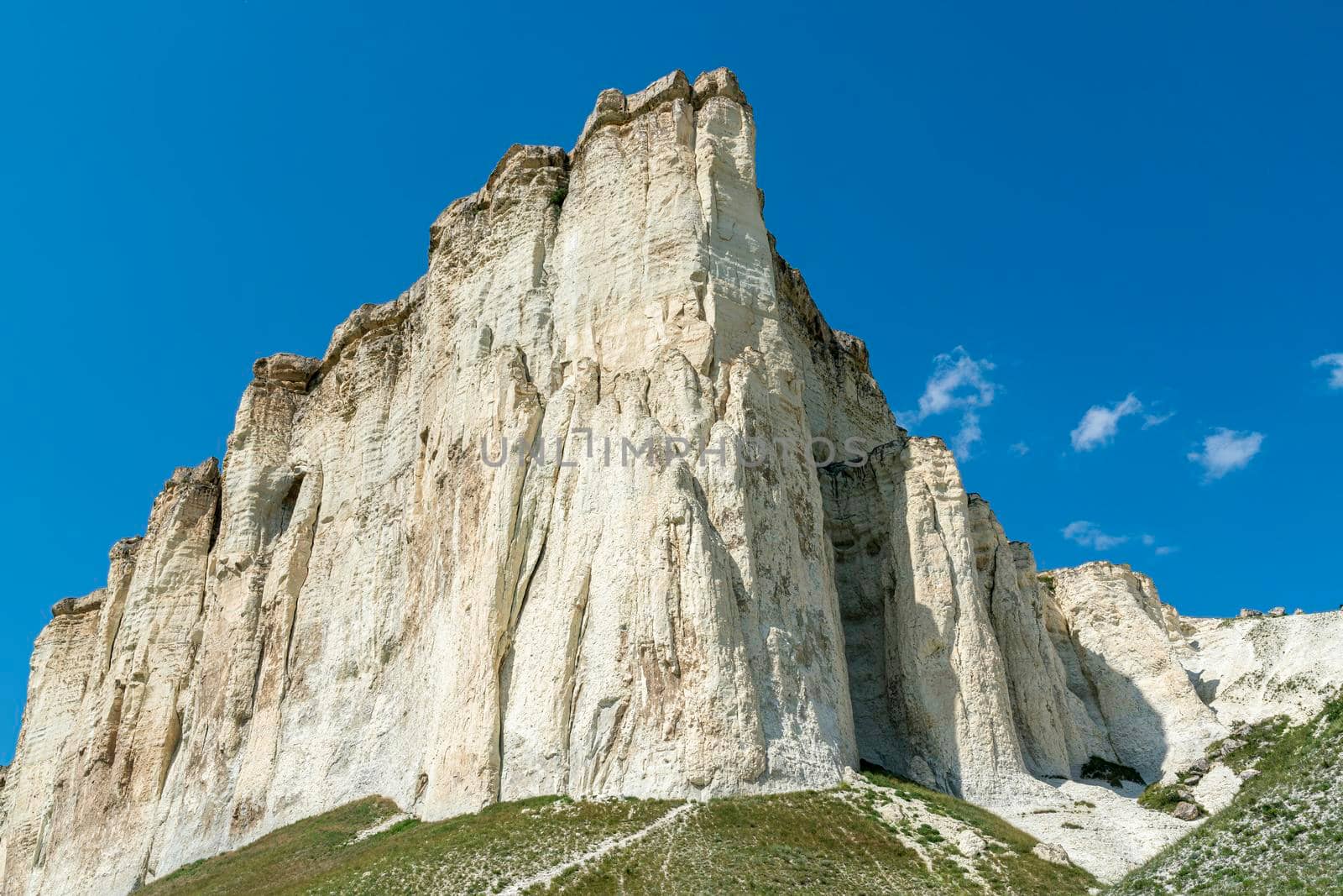 white chalk limestone rock against a blue sky aerial view. High quality photo