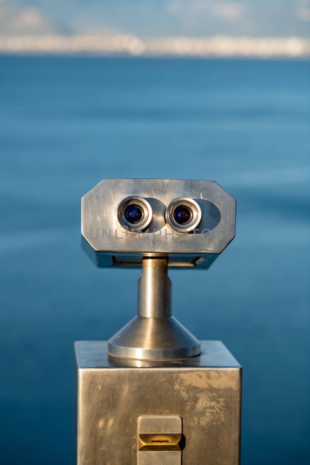 stationary observation binoculars at sunrise on a sunny winter day in Antalya Turkey