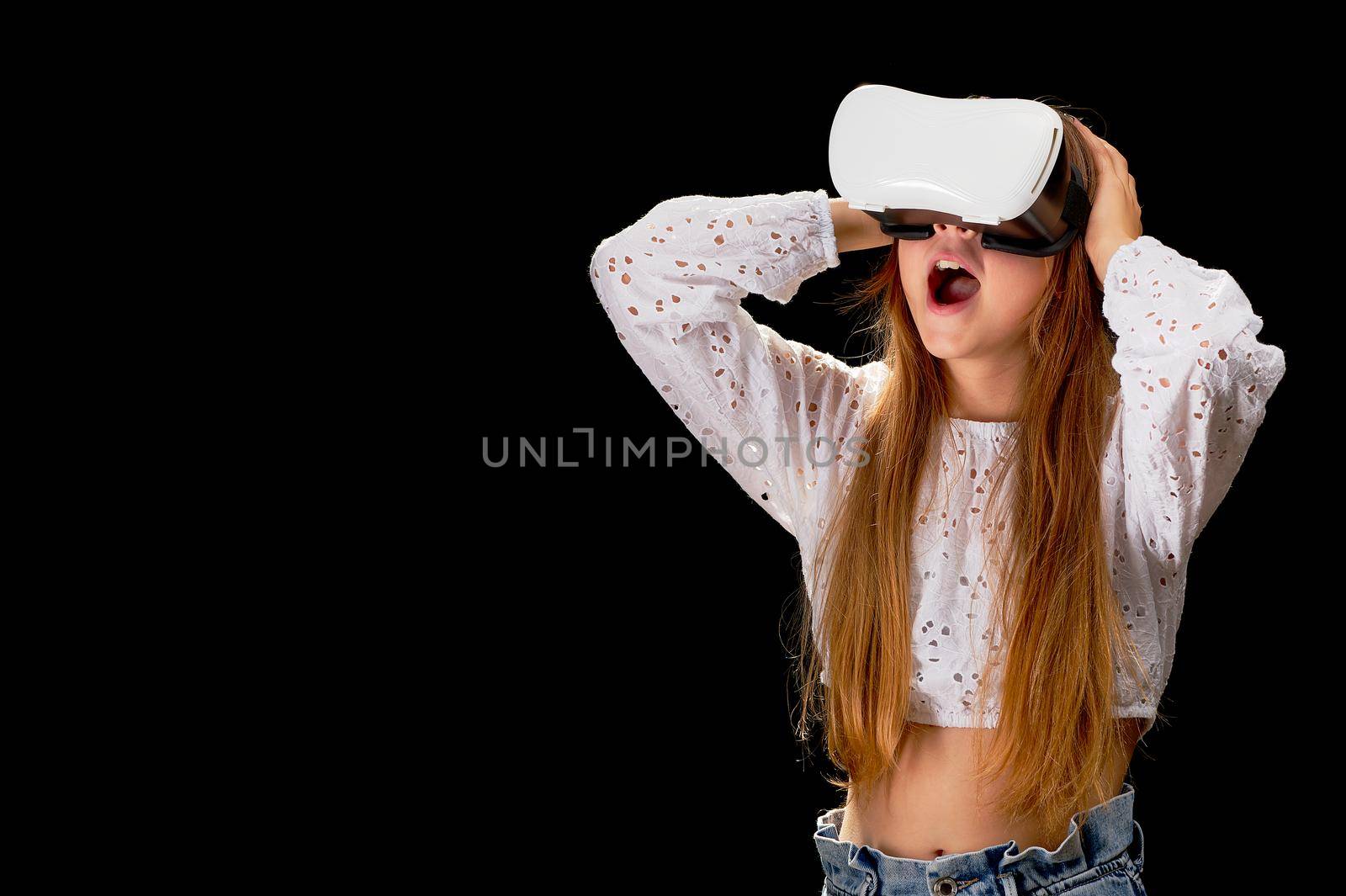 Young woman wearing VR glasses and interacting with virtual reality, entertainment, education and innovative technology concept. goggles to interact with metaverse