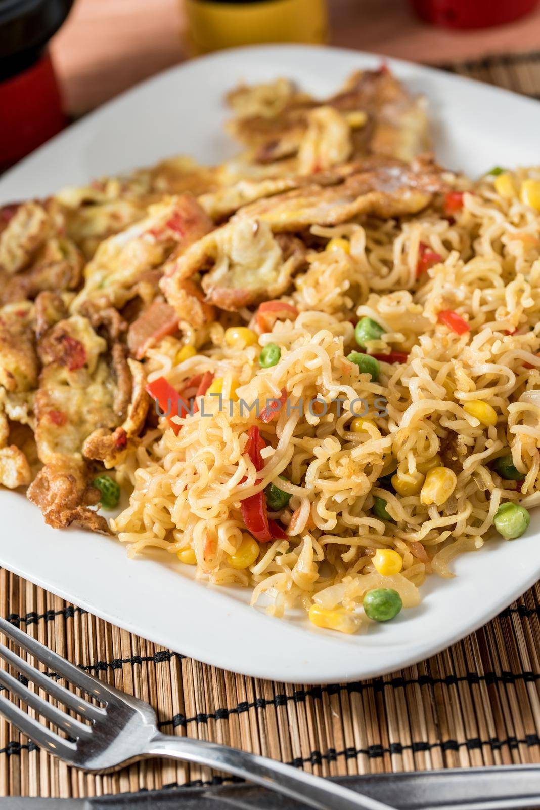 Regional African Food on white plate on wooden background