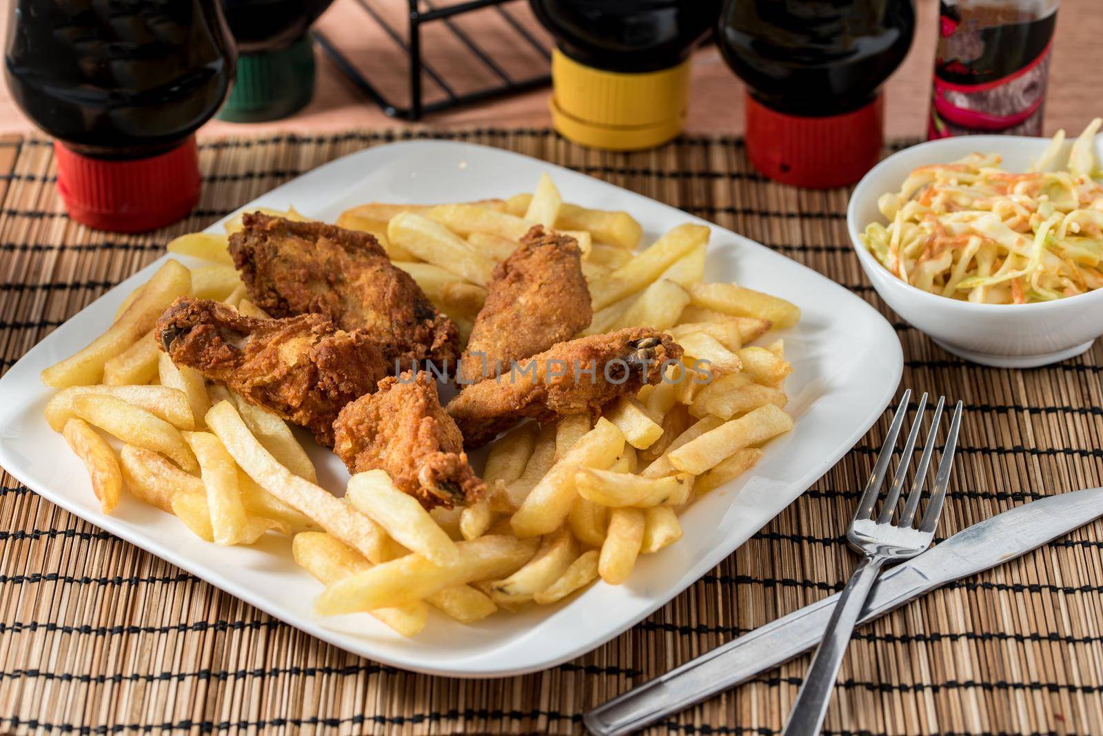 Regional African Food on white plate on wooden background