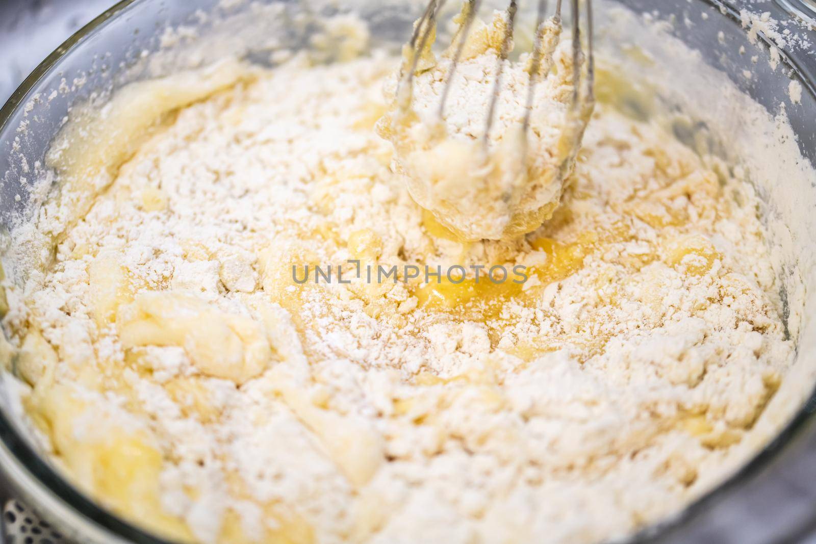 Motion blur photo of mixing homemade delicious cake