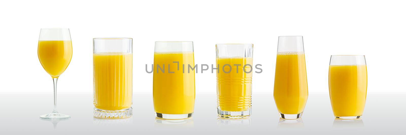 Collection of orange juice in different glasses . Separate clipping paths for each glass. by PhotoTime