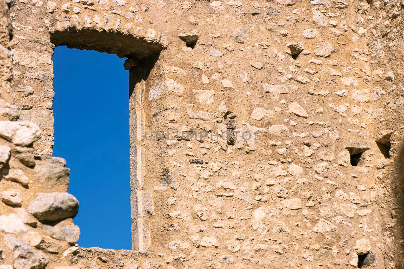 Stone window and brickwork of Chateau de Miglos, or d'Arquizat, a ruined castle in Miglos, Ariege, Occitanie, France. It is a listed national historic monument of France.