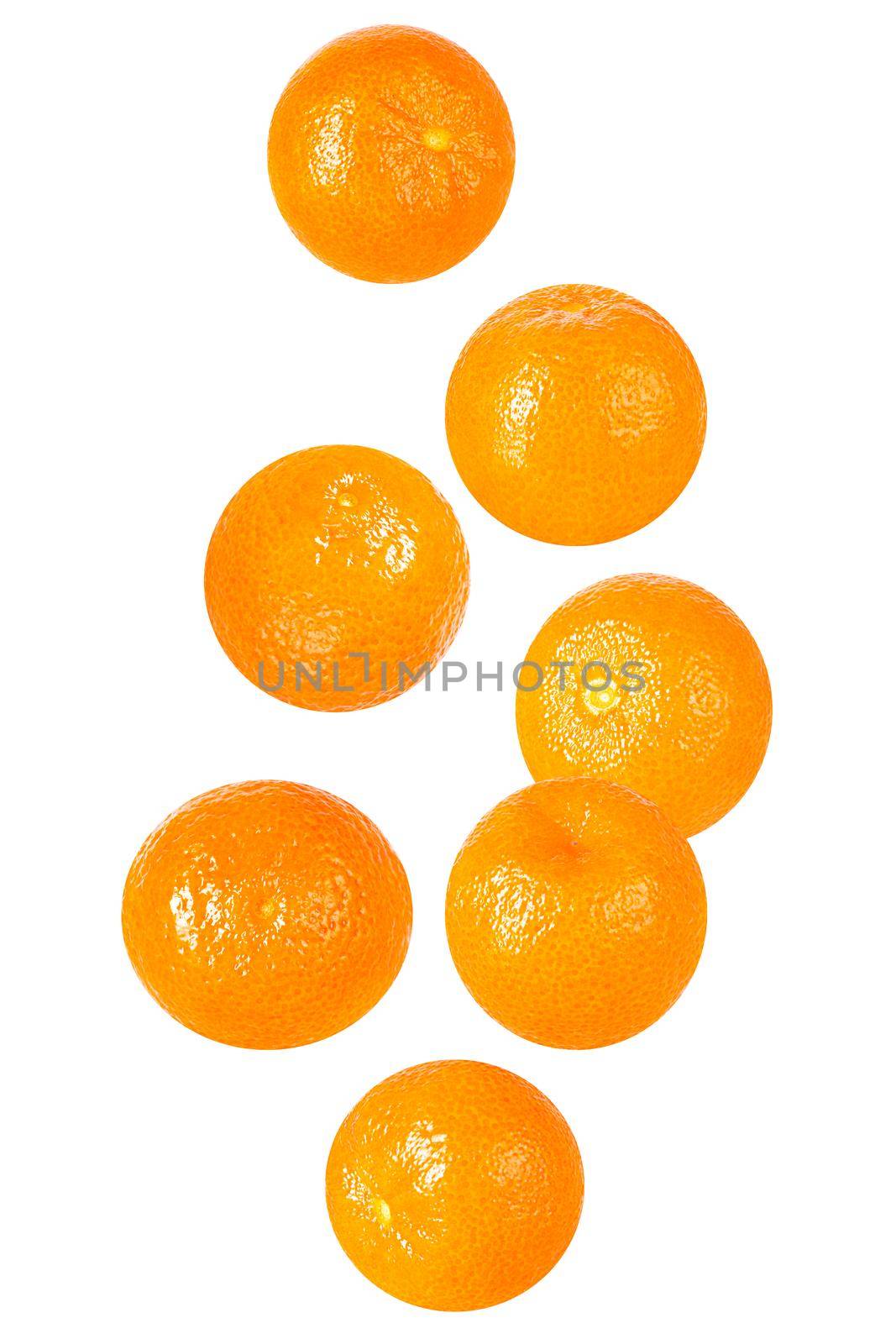 Isolated clementine fruits in the air on white background by Ciorba