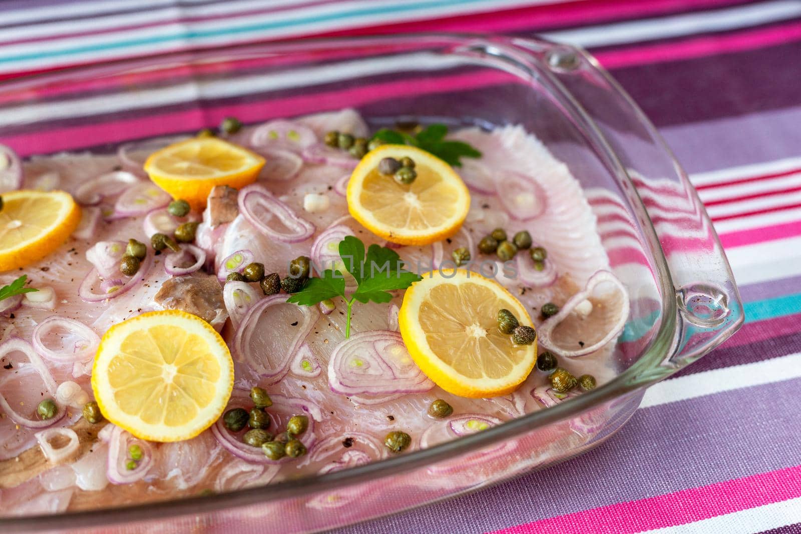 ray fish wings ready to prepare with capers, shallot and lemons