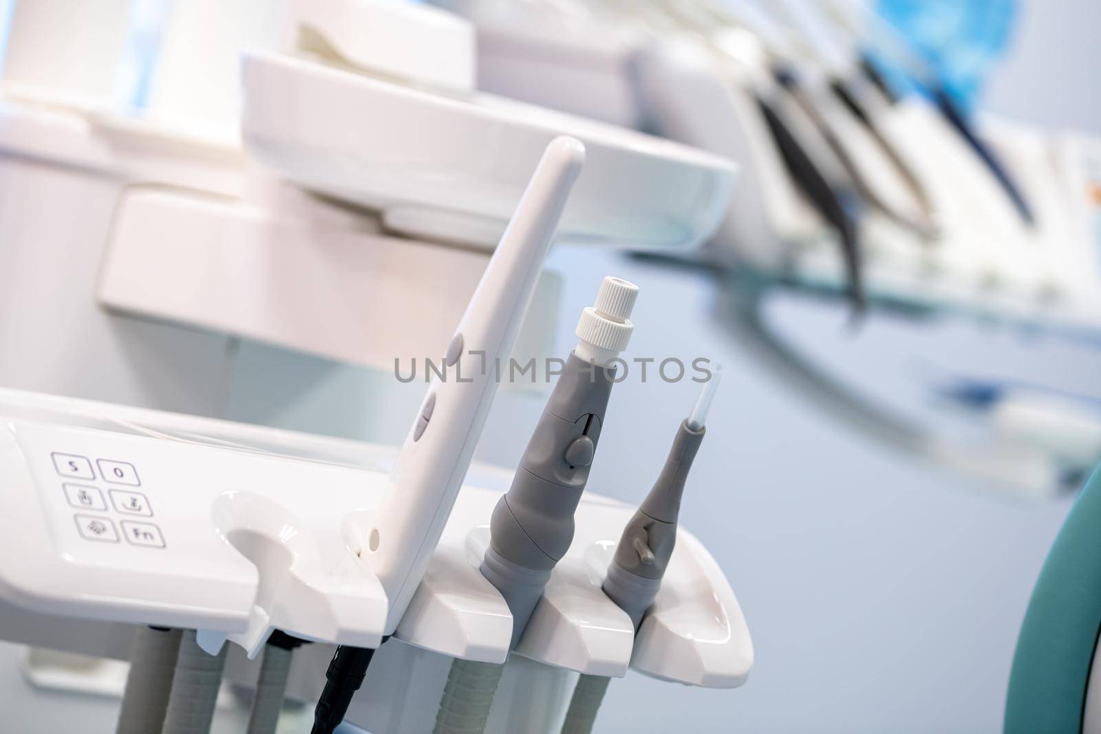 Modern dental practice. Dental chair and other accessories used by dentists by Sonat