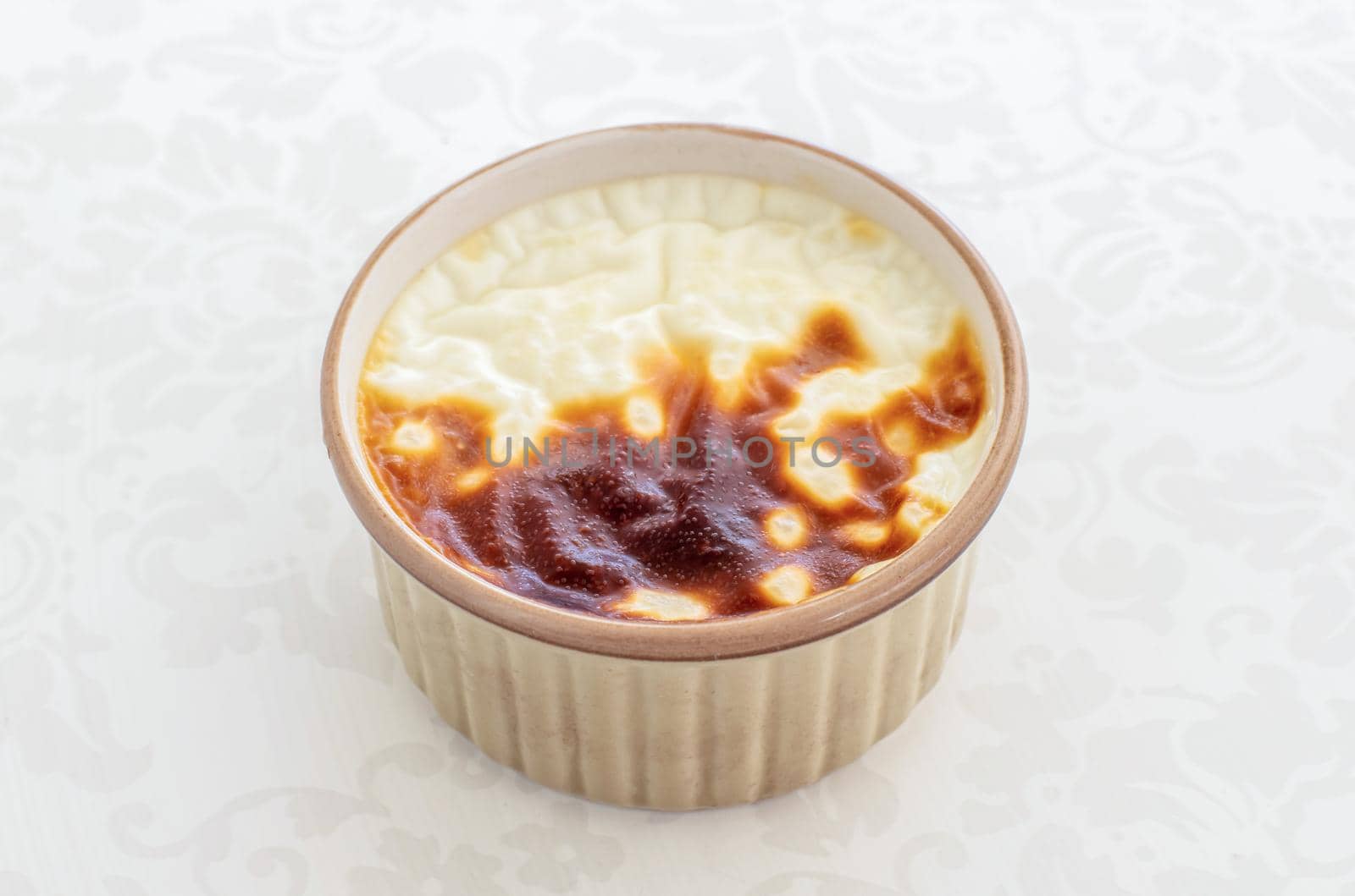Bakery rice pudding. Turkish milky sweet sutlac in casserole by Sonat