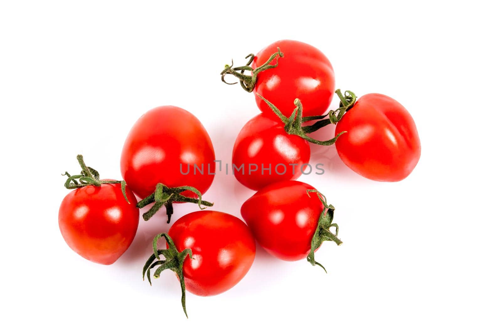 Fresh cherry tomatoes on a white background by Sonat