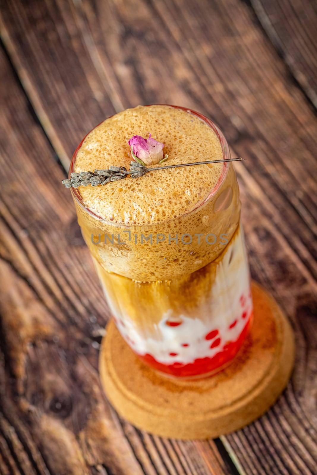 Fruity Bubble Tea in glass cup on wooden background