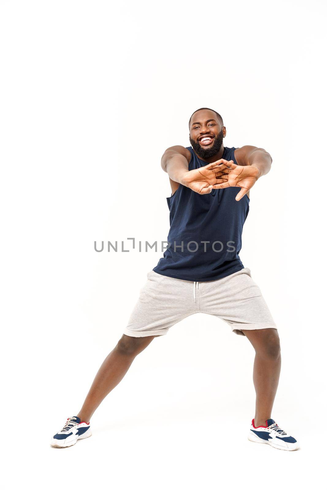 Healthy Looking Happy Young African American Male Ready Workout Isolated on White Background by Benzoix