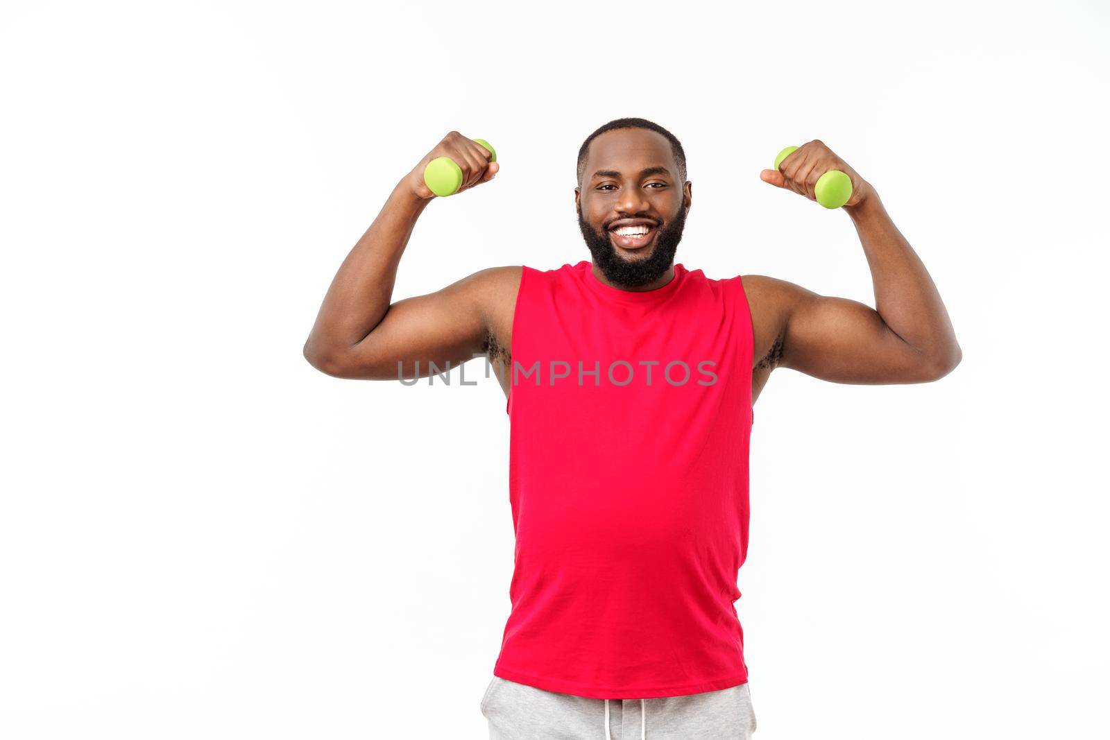 Young African American Athlete Holding Lifting Dumbbells on Isolated White Background. by Benzoix