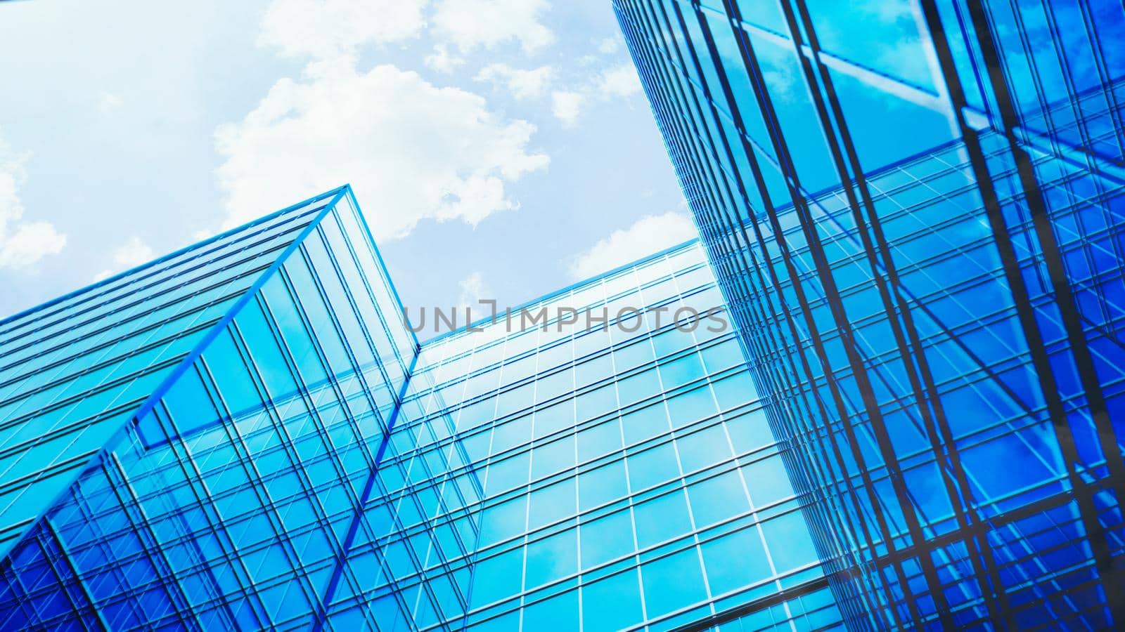 Glass building. Transparent glass wall of office building. Modern office building with glass facade on a clear sky background. 3d Rendering.