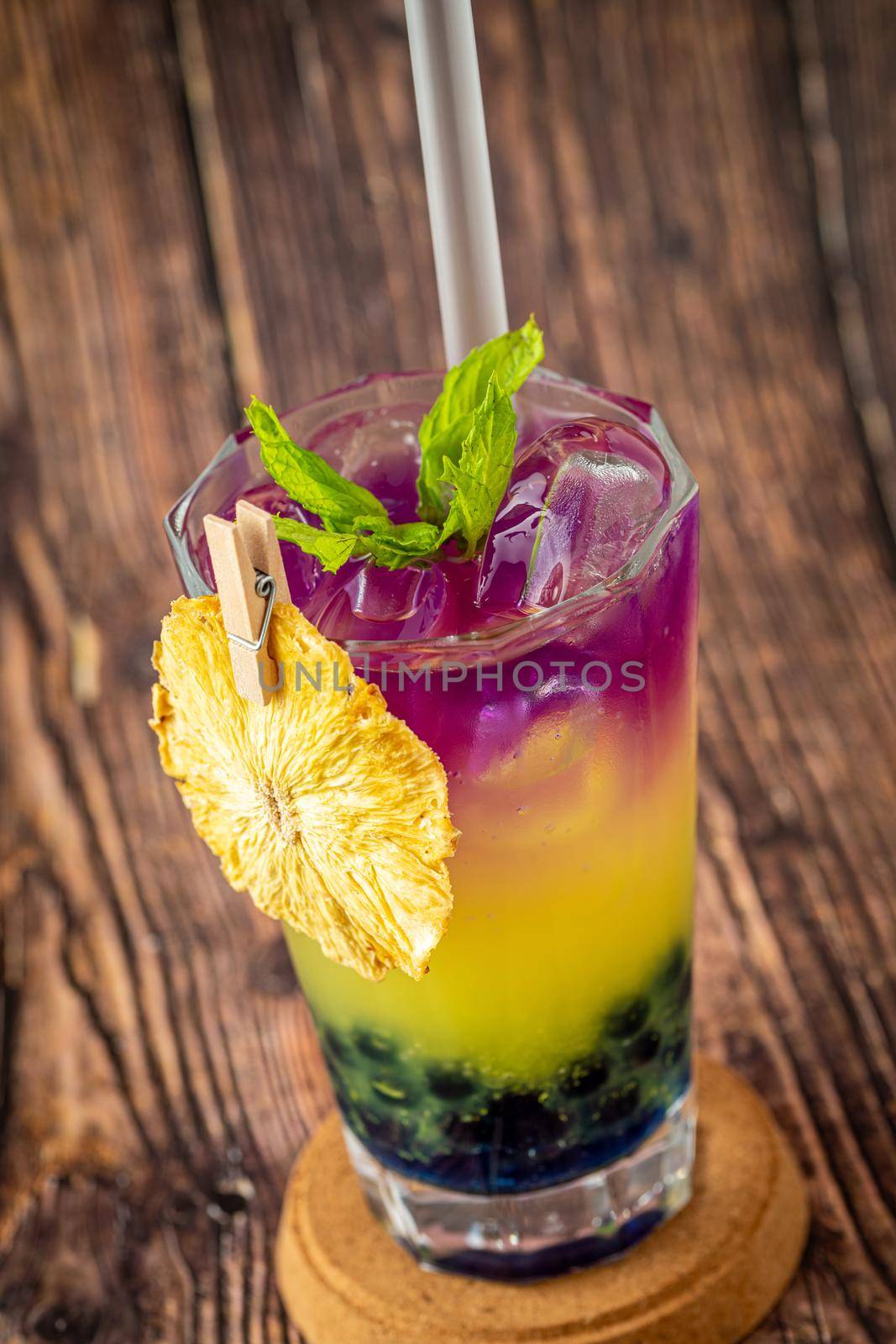 Fruity Bubble Tea in glass cup on wooden background