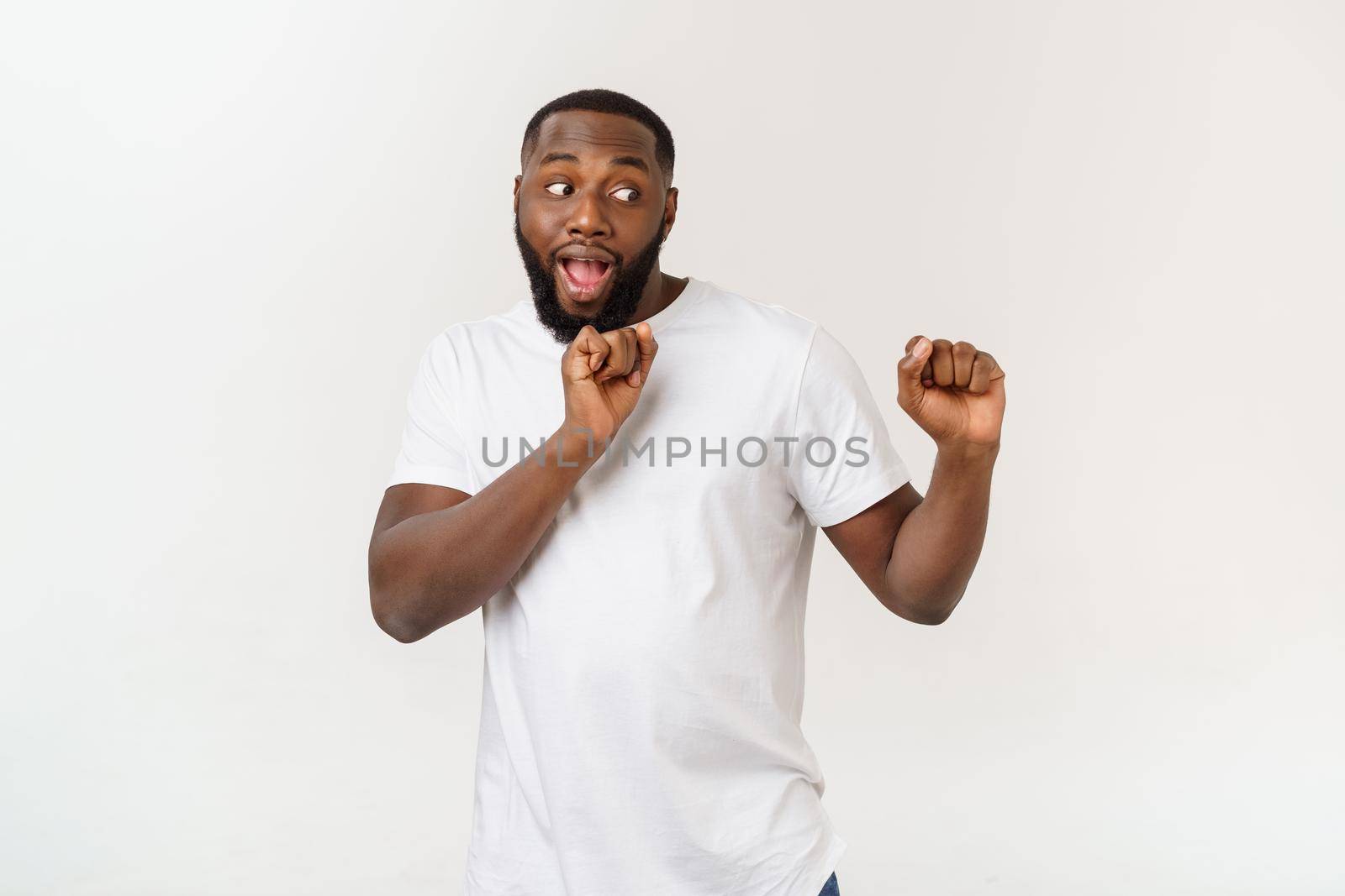 African American hip hop dancer performing isolated over white background