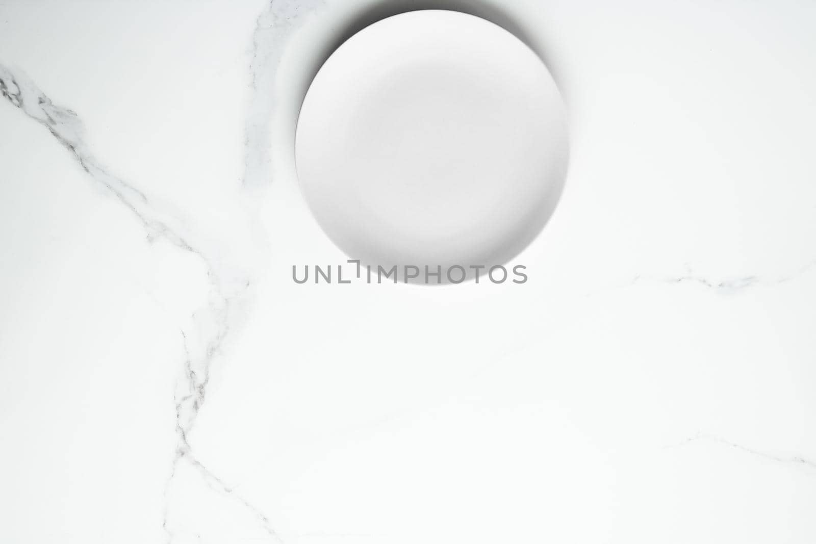 White empty plate on marble, flatlay - stylish tableware, romantic table decor and food menu concept. Serve the perfect dish