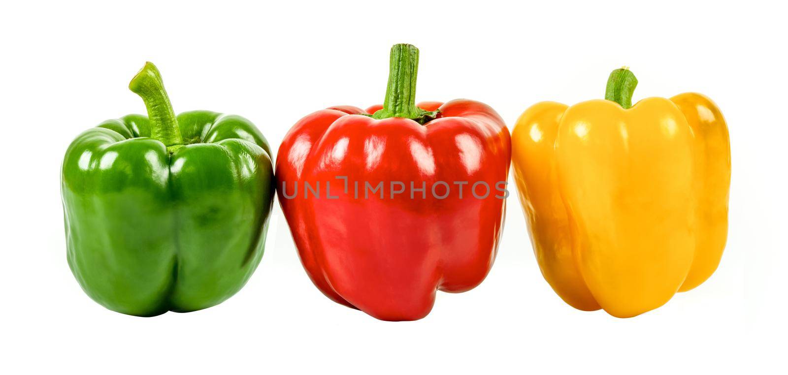 Yellow, green and red pepper isolated on white background