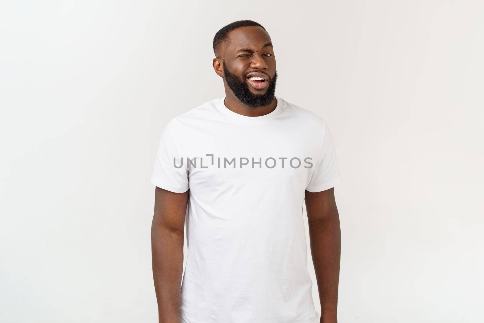 Natural Looking Smiling Young African American Male Model on Isolated Background