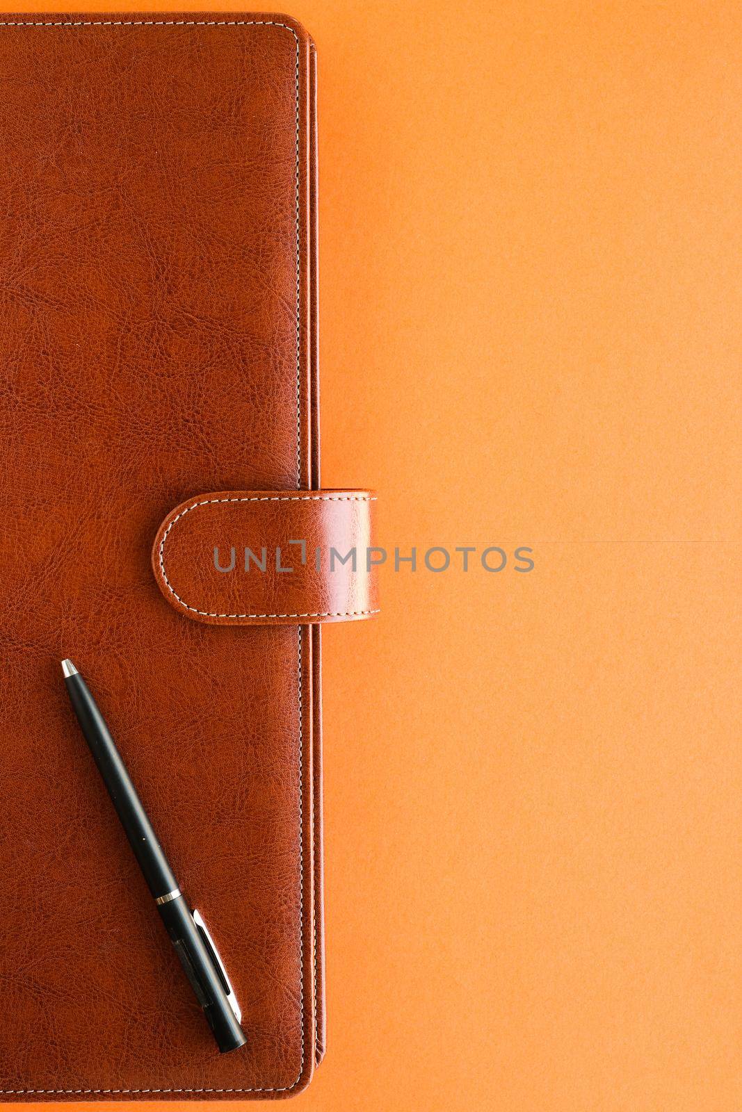 Modern workspace, productivity and corporate lifestyle concept - Luxury business brown brief-case on the office table desk, flatlay