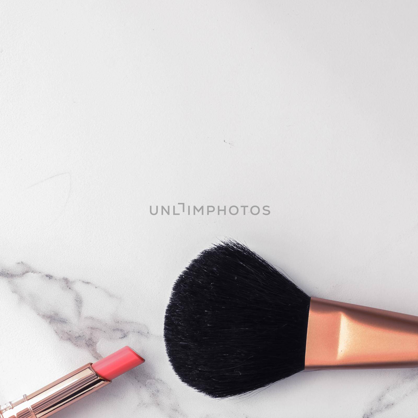 Make-up and cosmetics flatlay on marble by Anneleven