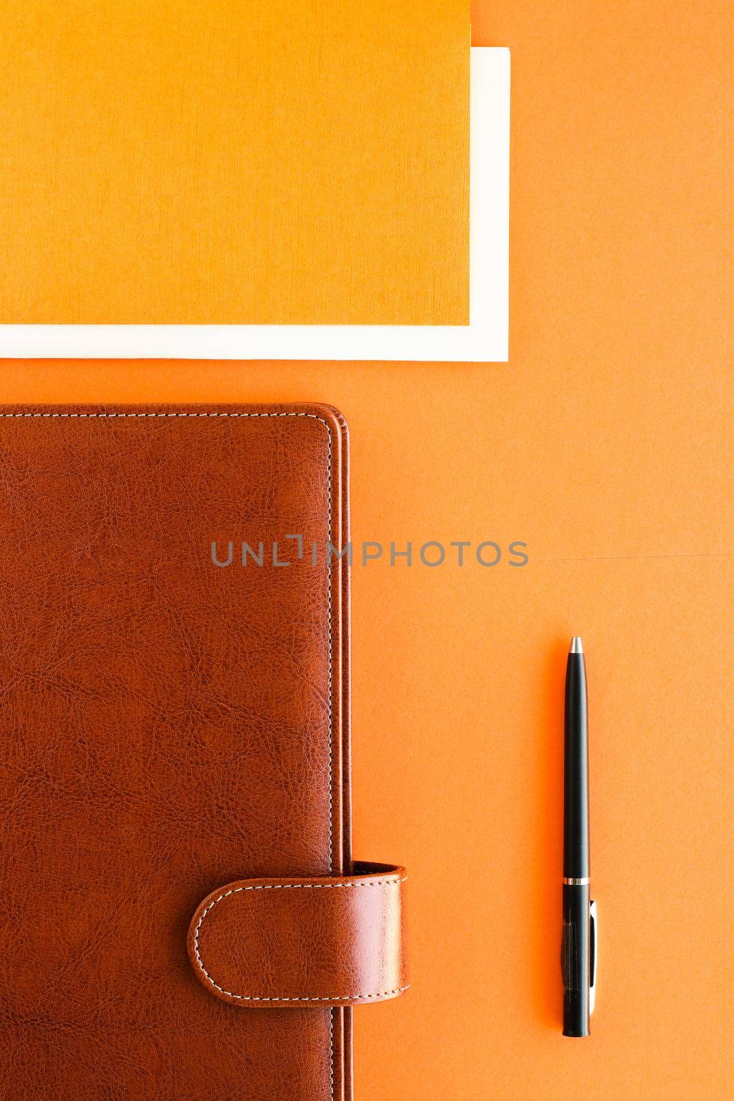 Luxury business brown brief-case on the office table desk, flatlay by Anneleven