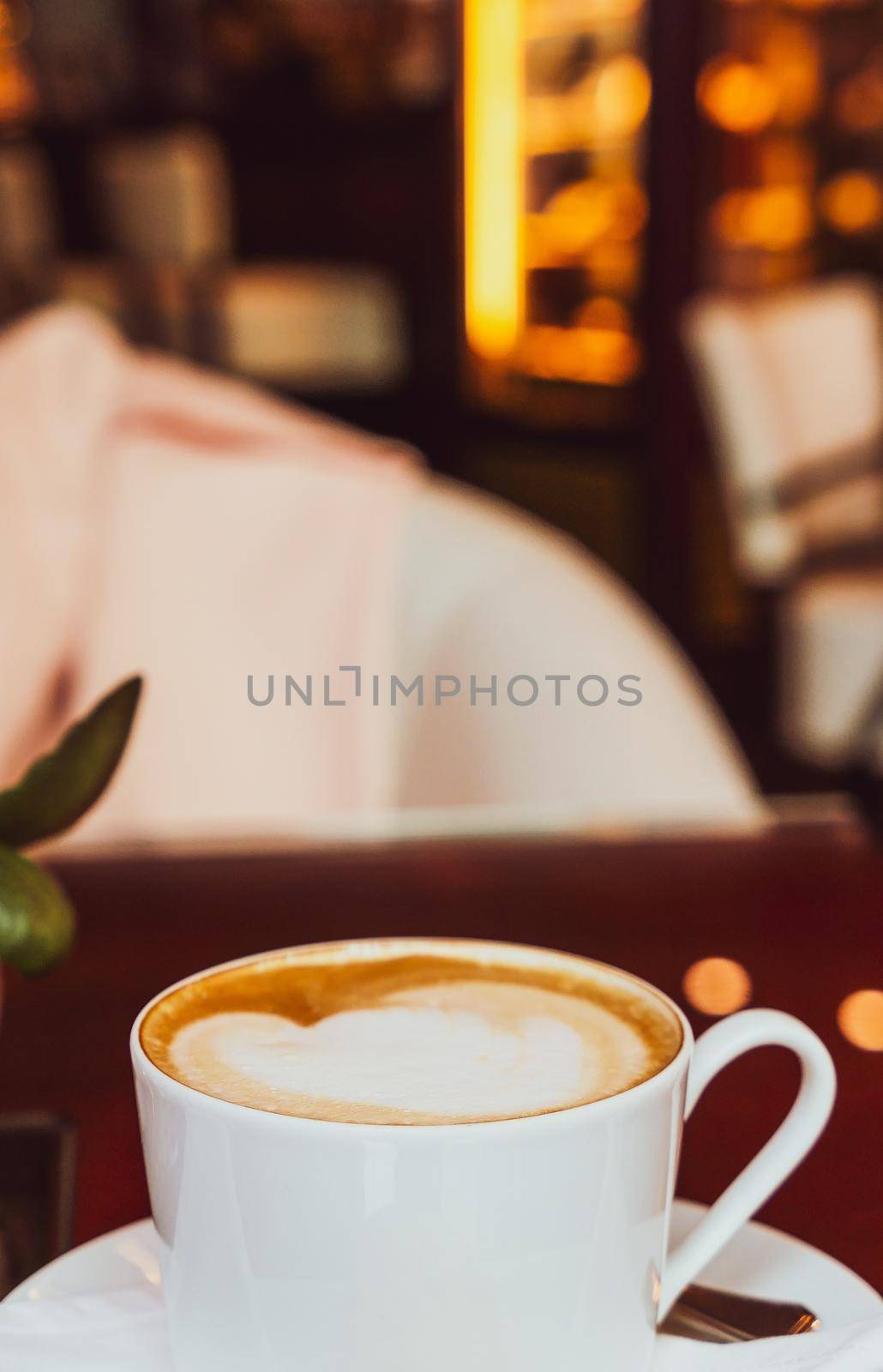 Breakfast, food and drinks and service concept - Cappuccino in a restaurant, at a coffee break