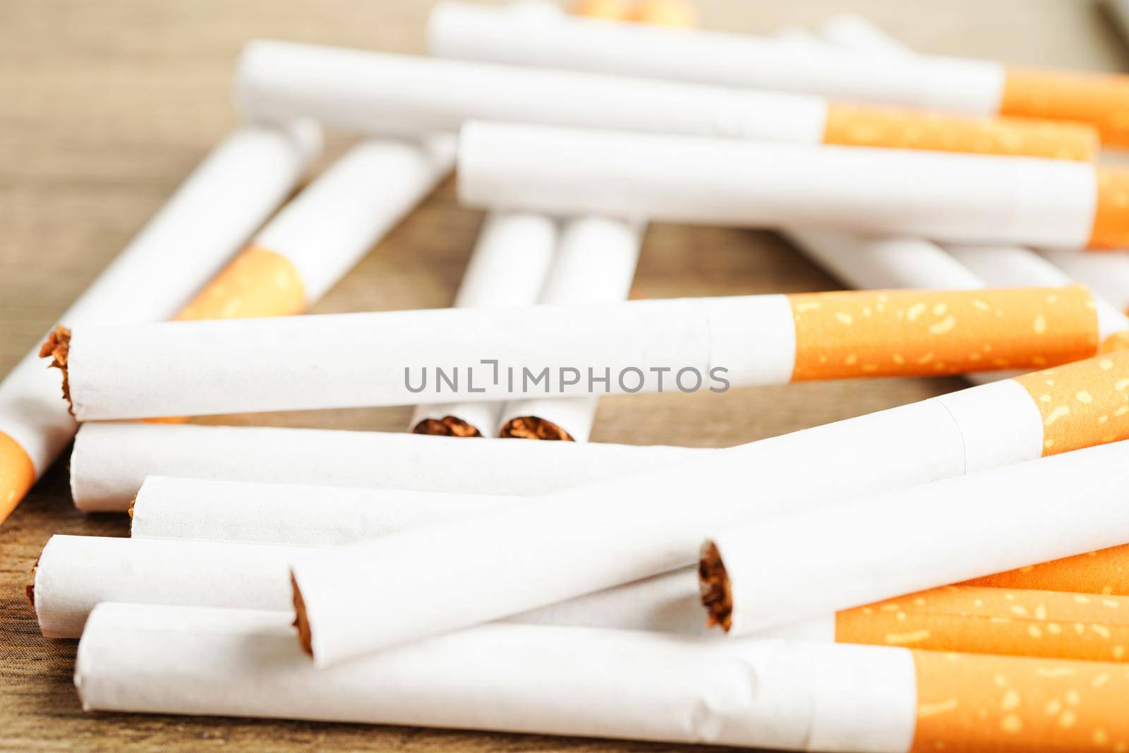 Cigarette, roll tobacco in paper with filter tube, No smoking concept.
