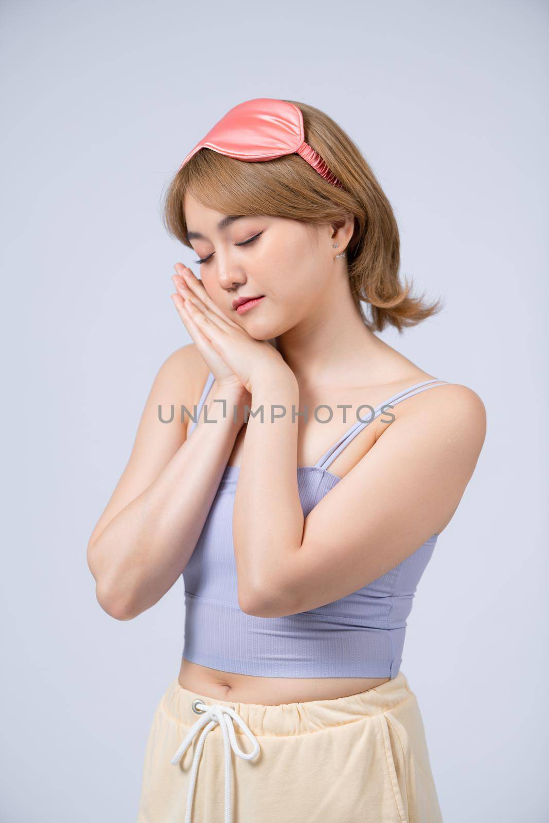 Sleepy beauty woman resting on hand.