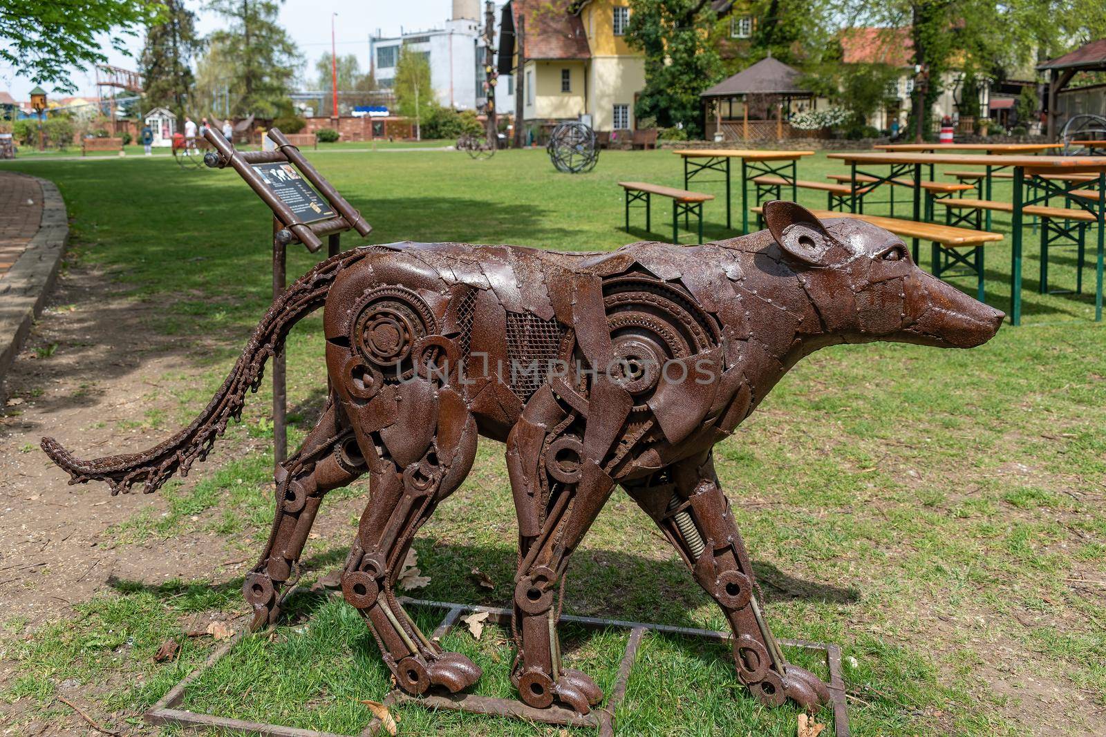 Stare Mesto, Czech Republic 29 April 2022 KOVOZOO original exposition with animals and technology from recycled old scrap. Statue of a wolf made of metal waste