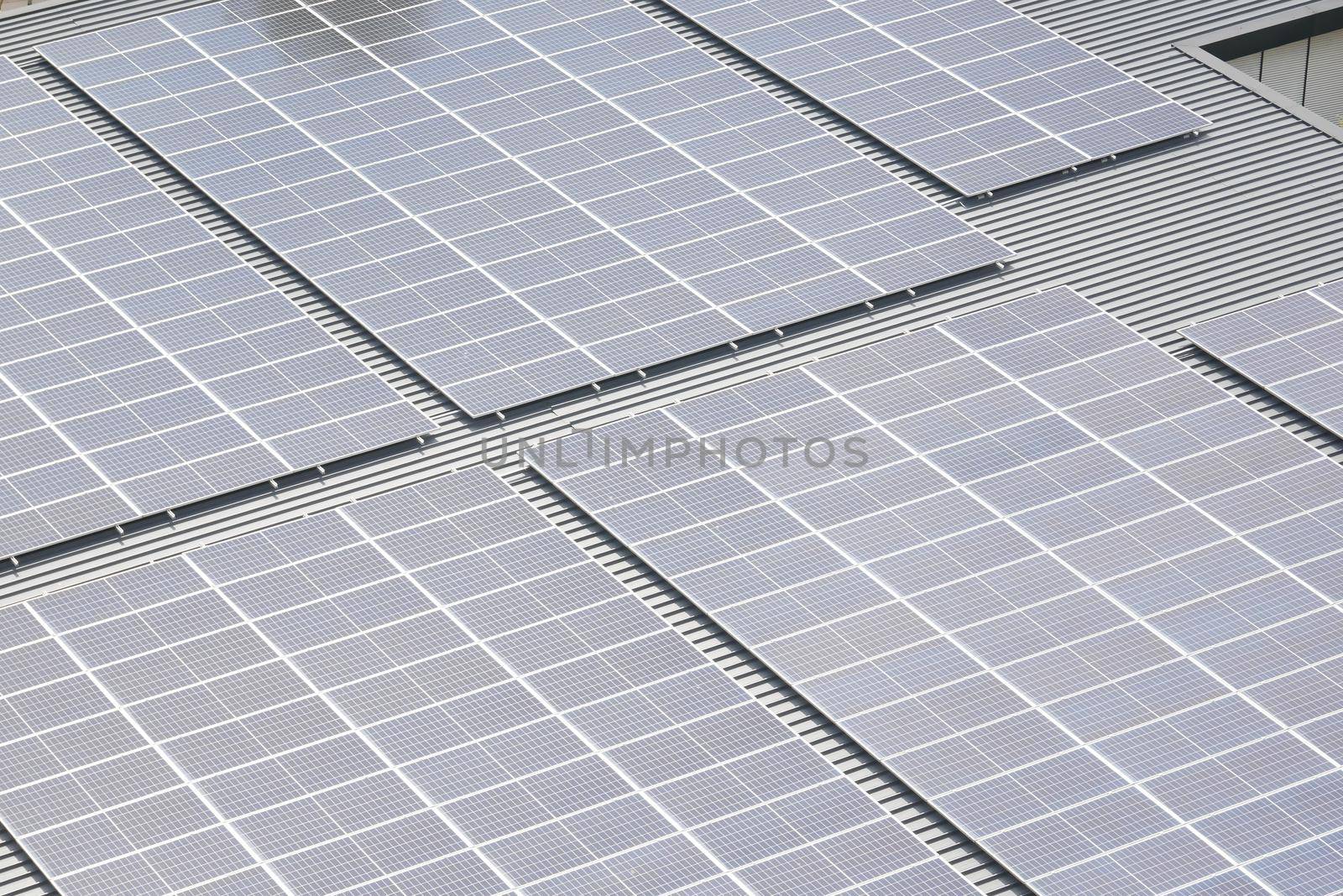Solar pannels on a roof top .