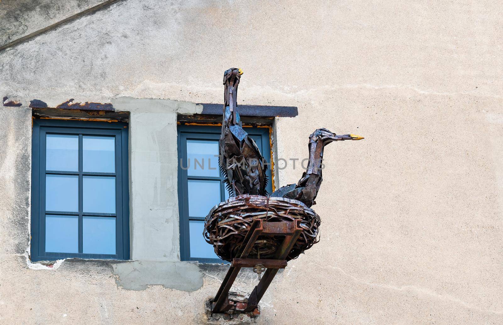 Stare Mesto, Czech Republic 29 April 2022 KOVOZOO original exposition of metal waste, technology and retro objects. Stork's nest made of scrap metal