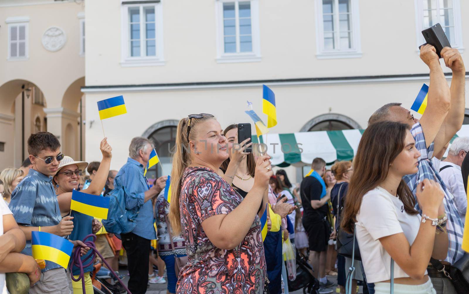 LJUBLJANA, SLOVENIA - August 24, 2022: Ukraine independence day meeting. People with flags and national symbols. High quality photo