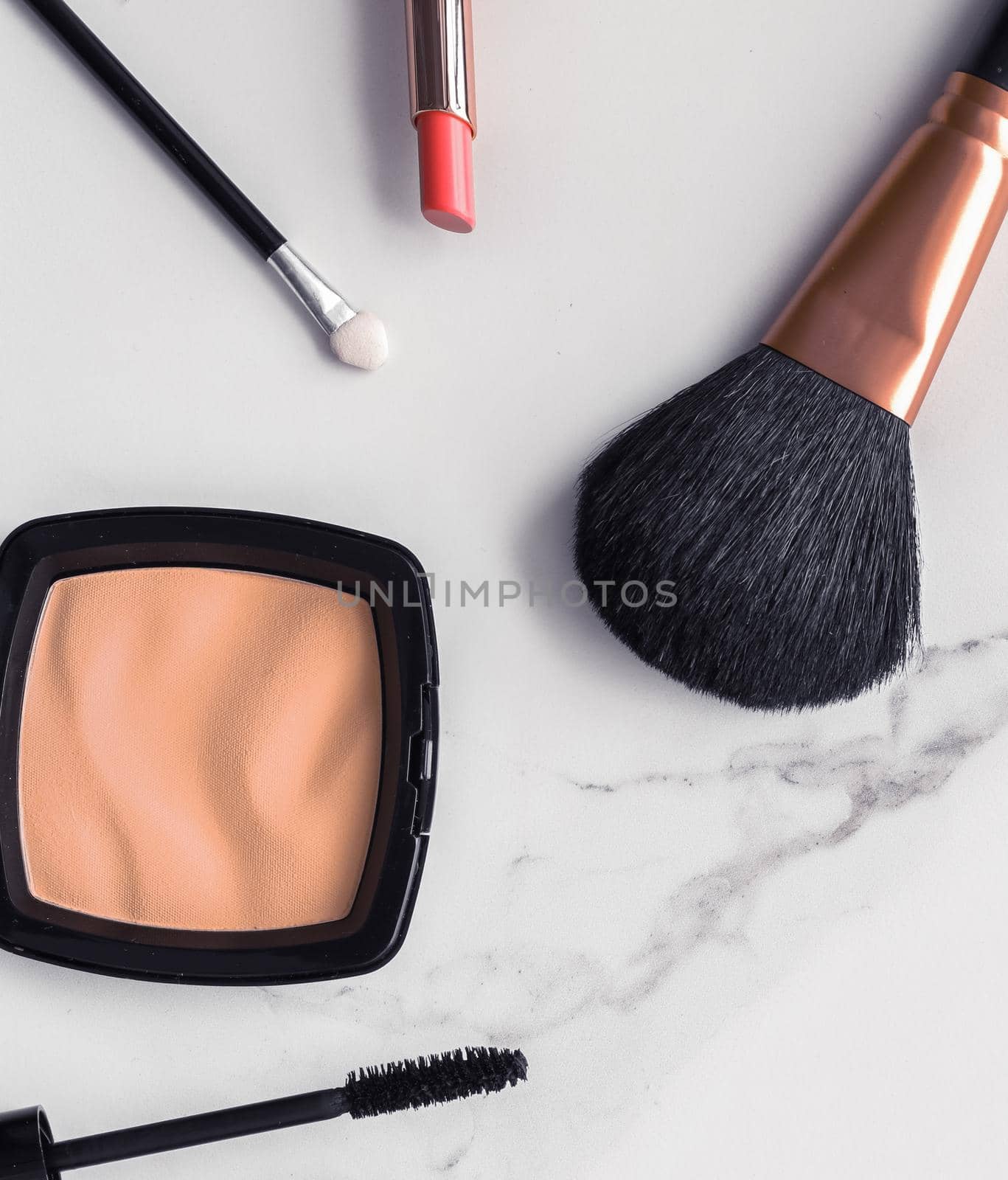 Make-up and cosmetics flatlay on marble by Anneleven