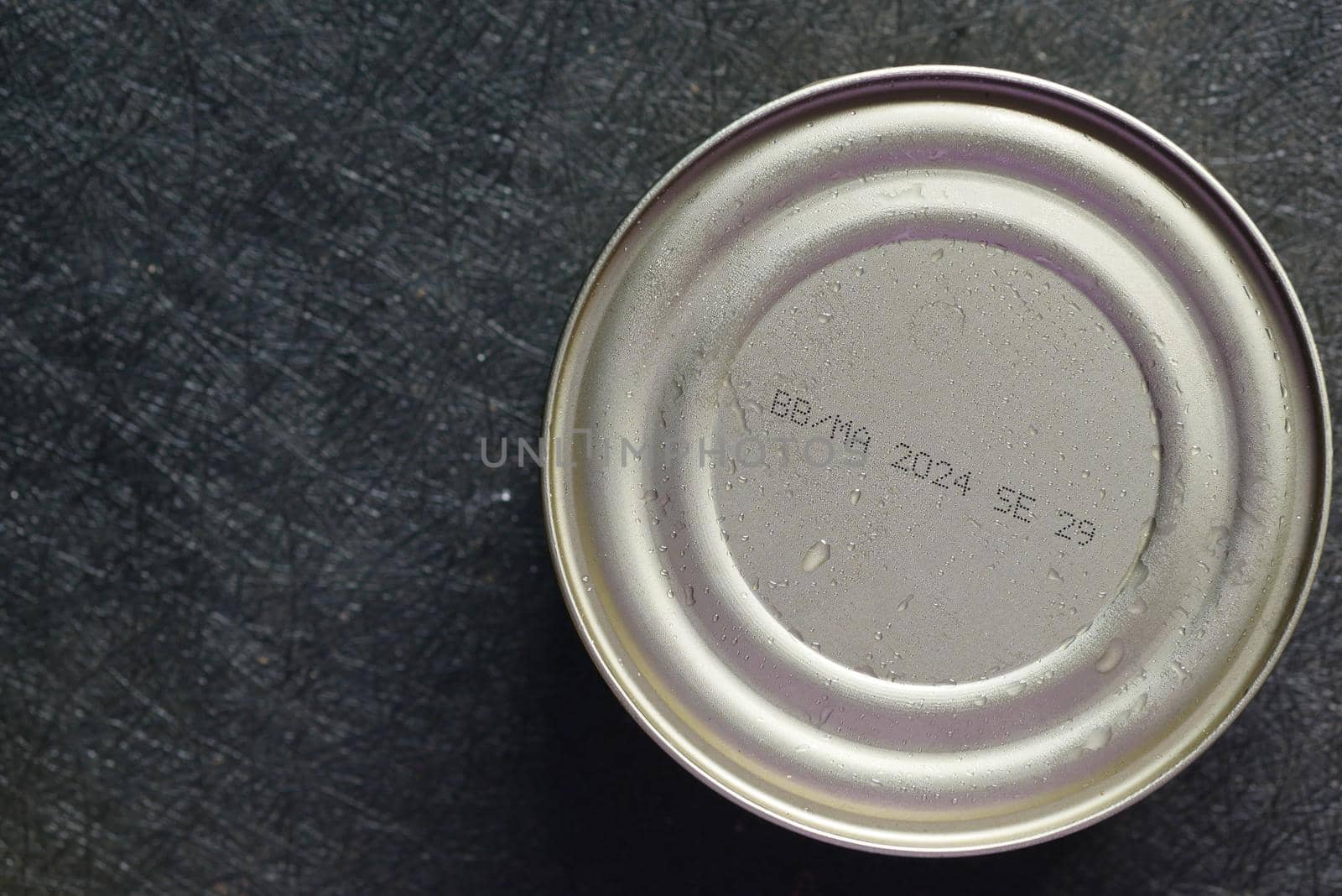 expire date on food can on white background