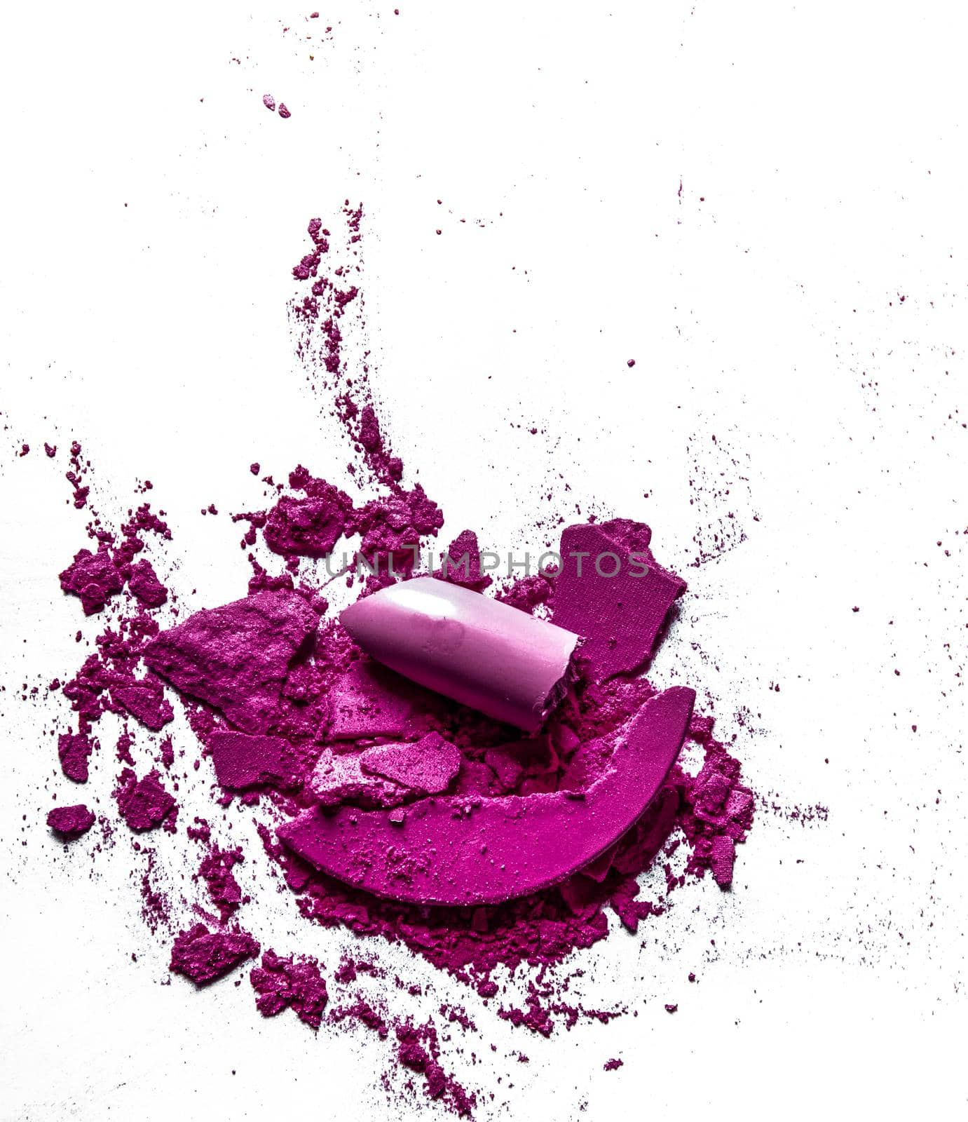 Crushed eyeshadows, lipstick and powder isolated on white background by Anneleven