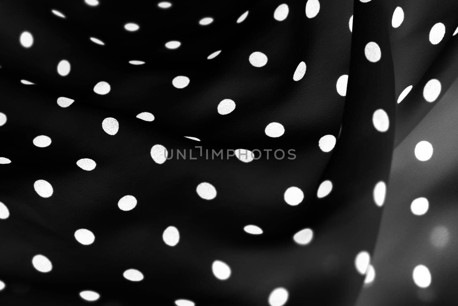 Fashion design, interior decor and classic material concept - Vintage polka dot textile background texture, white dots on black luxury fabric design pattern