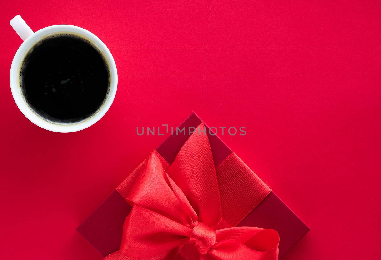 Romantic celebration, lifestyle and birthday present concept - Luxury beauty gift box and coffee on red, flatlay