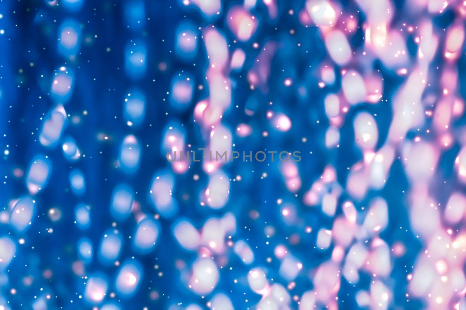 Christmas lights, New Years Eve fireworks and abstract texture concept - Magic sparkling shiny glitter and glowing snow, luxury winter holiday background