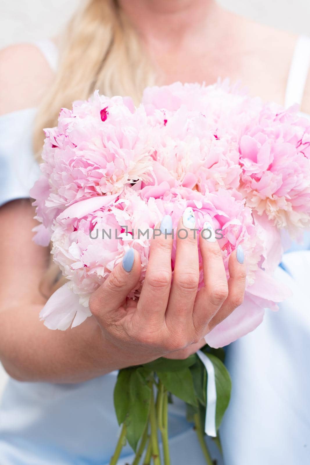 bride in a blue wedding dress with a bouquet of pink peonies, pastel paradise by KaterinaDalemans
