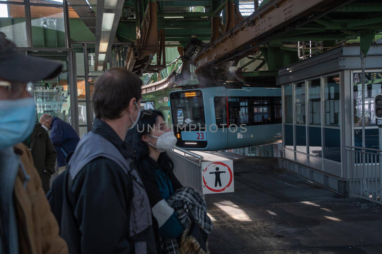 WUPPERTAL, GERMANY - April 11, 2022: Wuppertaler Schwebebahn, Wuppertal Suspension Railway, train in Germany. The unique electric monorail system is Wuppertal's landmark. High quality photo