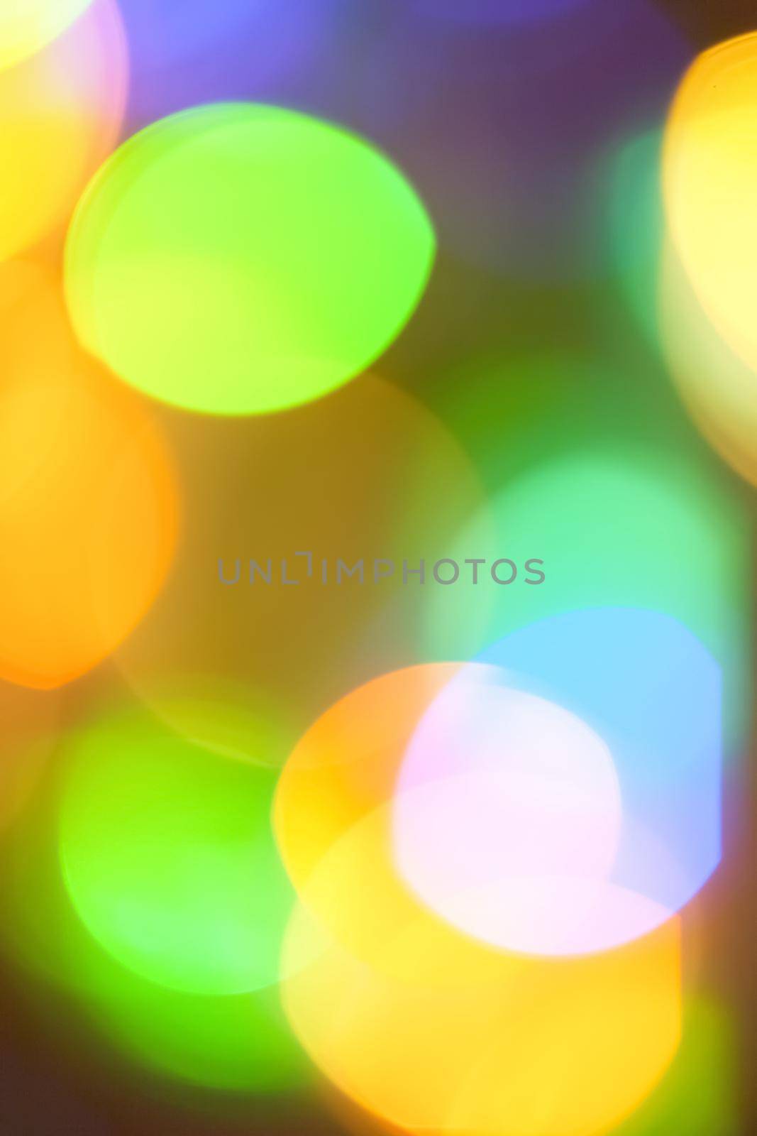 Colourful lights bokeh - abstract background, defocused overlay, bright colours concept