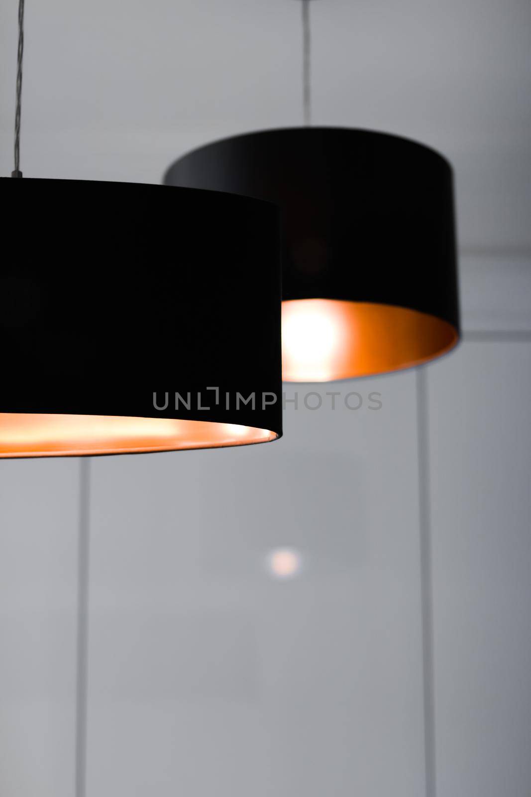 Interior design, indoor lamps and electricity concept - Bronze lamp in a room, elegant modern home decor lighting