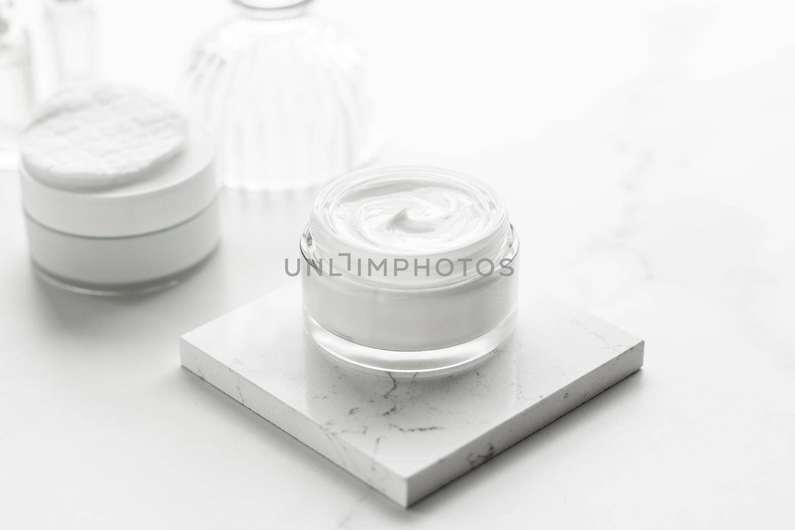 Luxury skincare cosmetics in a bathroom by Anneleven