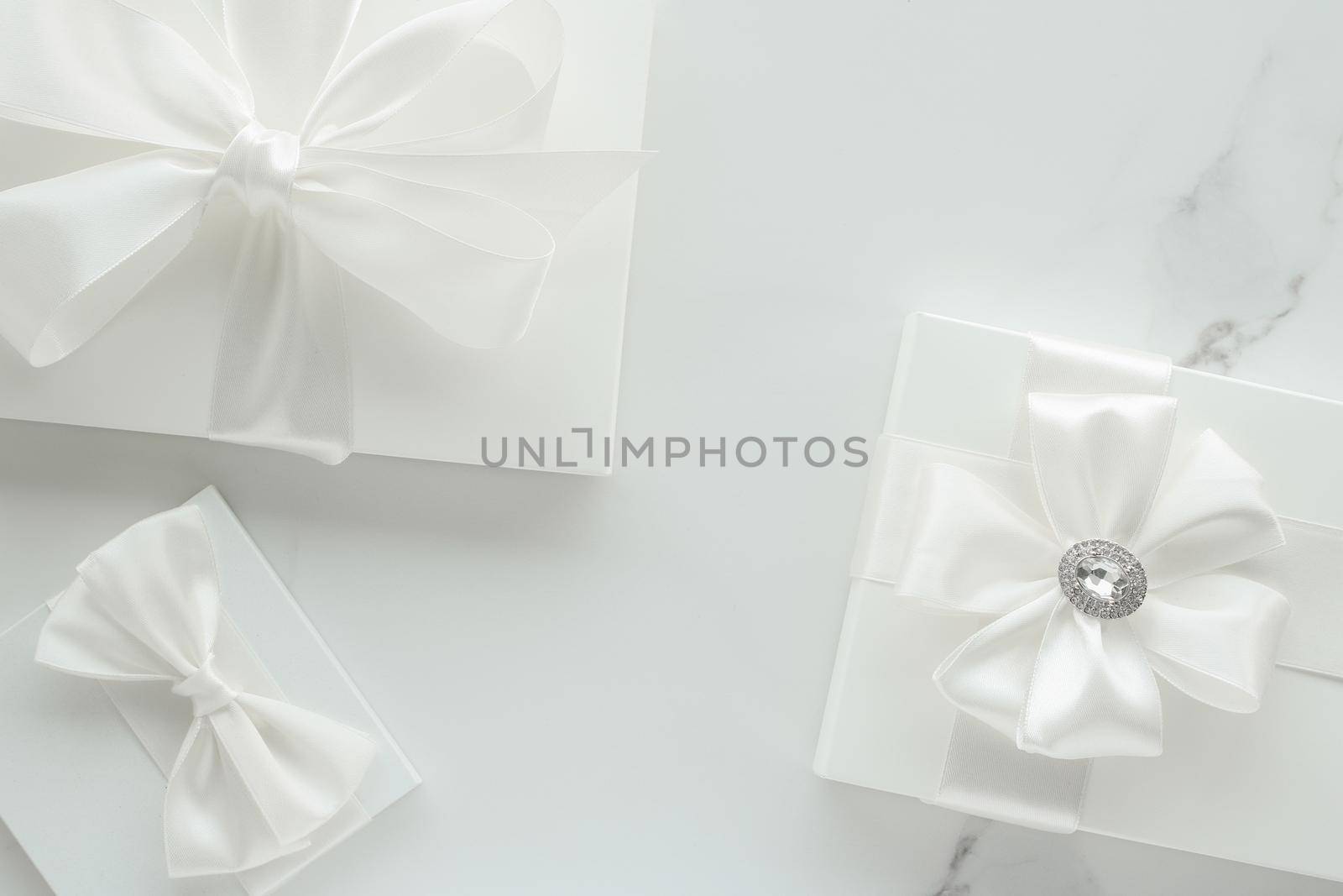 Romantic celebration, lifestyle and holiday present concept - Luxury wedding gifts on marble