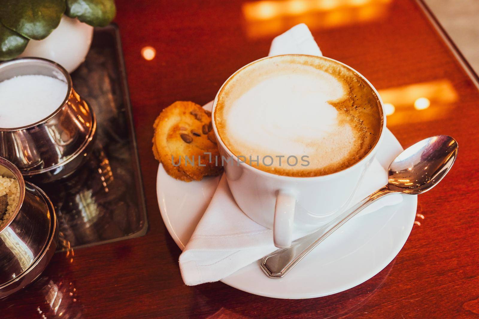 Breakfast, food and drinks and service concept - Cappuccino in a restaurant, at a coffee break