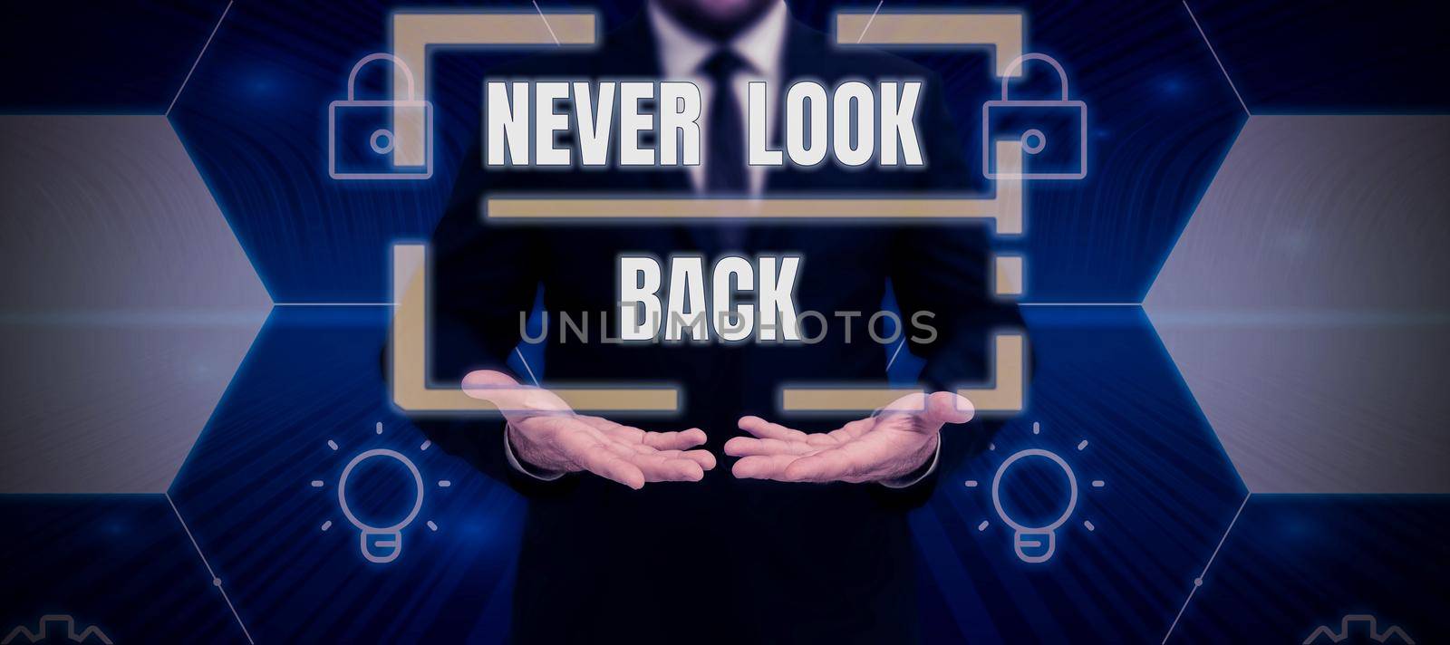 Sign displaying Never Look Back. Concept meaning Do not have regrets for your actions be optimistic Male and female colleagues doing presentation on stage with hand gestures. by nialowwa