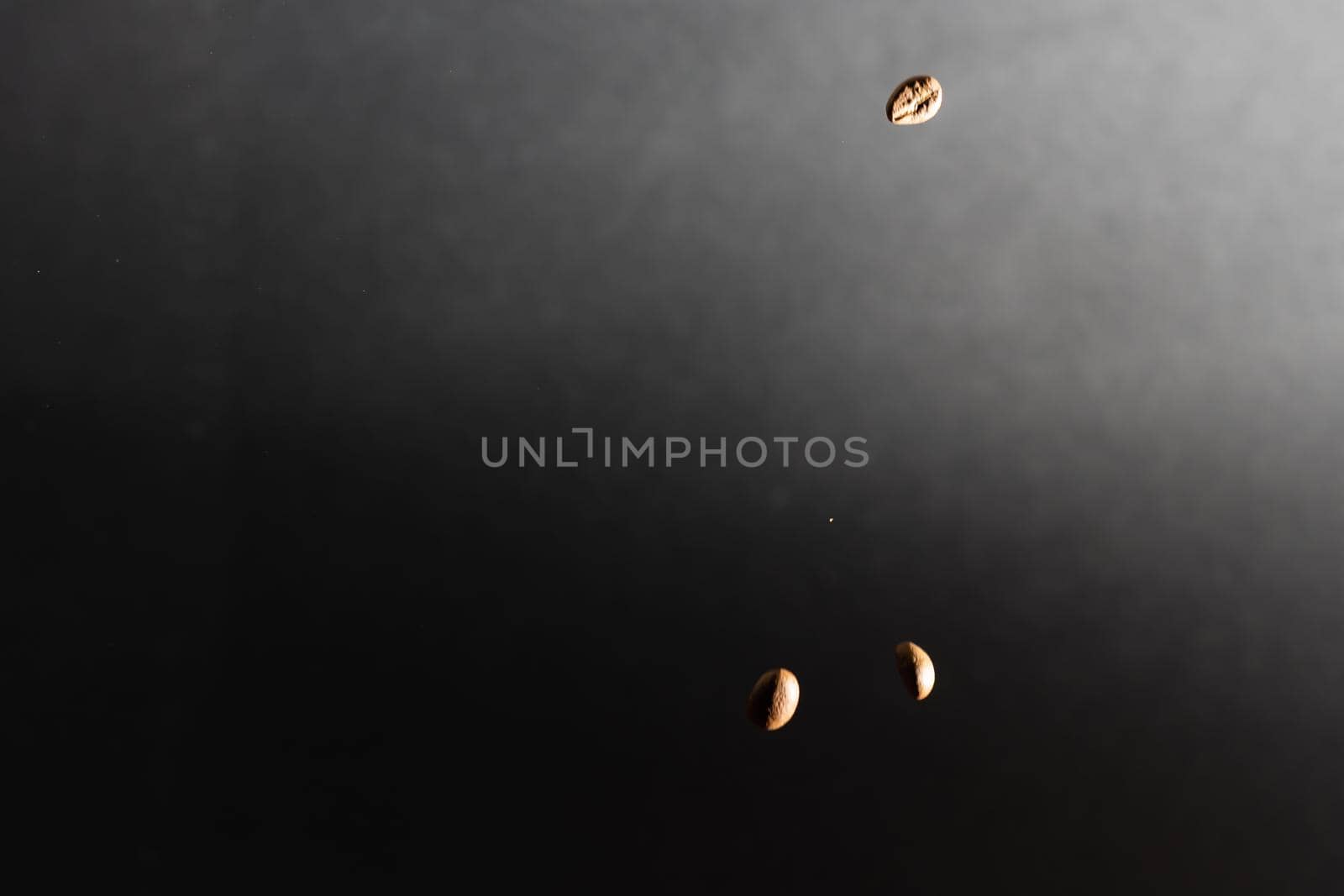 coffee beans on black background.